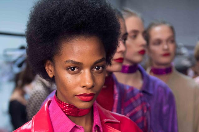 Magenta lips complimented an already vivid collection at Trussardi