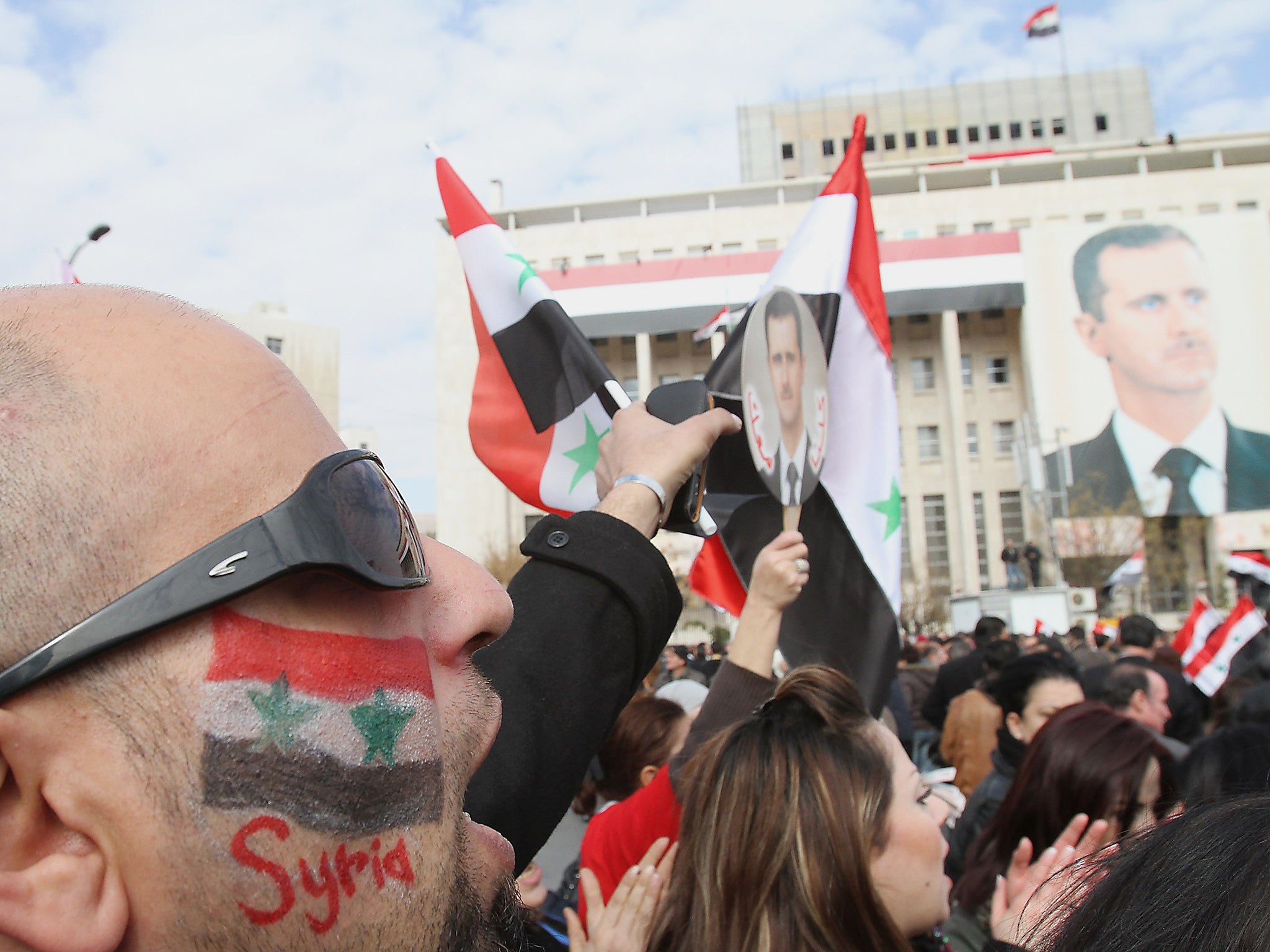 A pro-Assad rally in Damascus, 2012