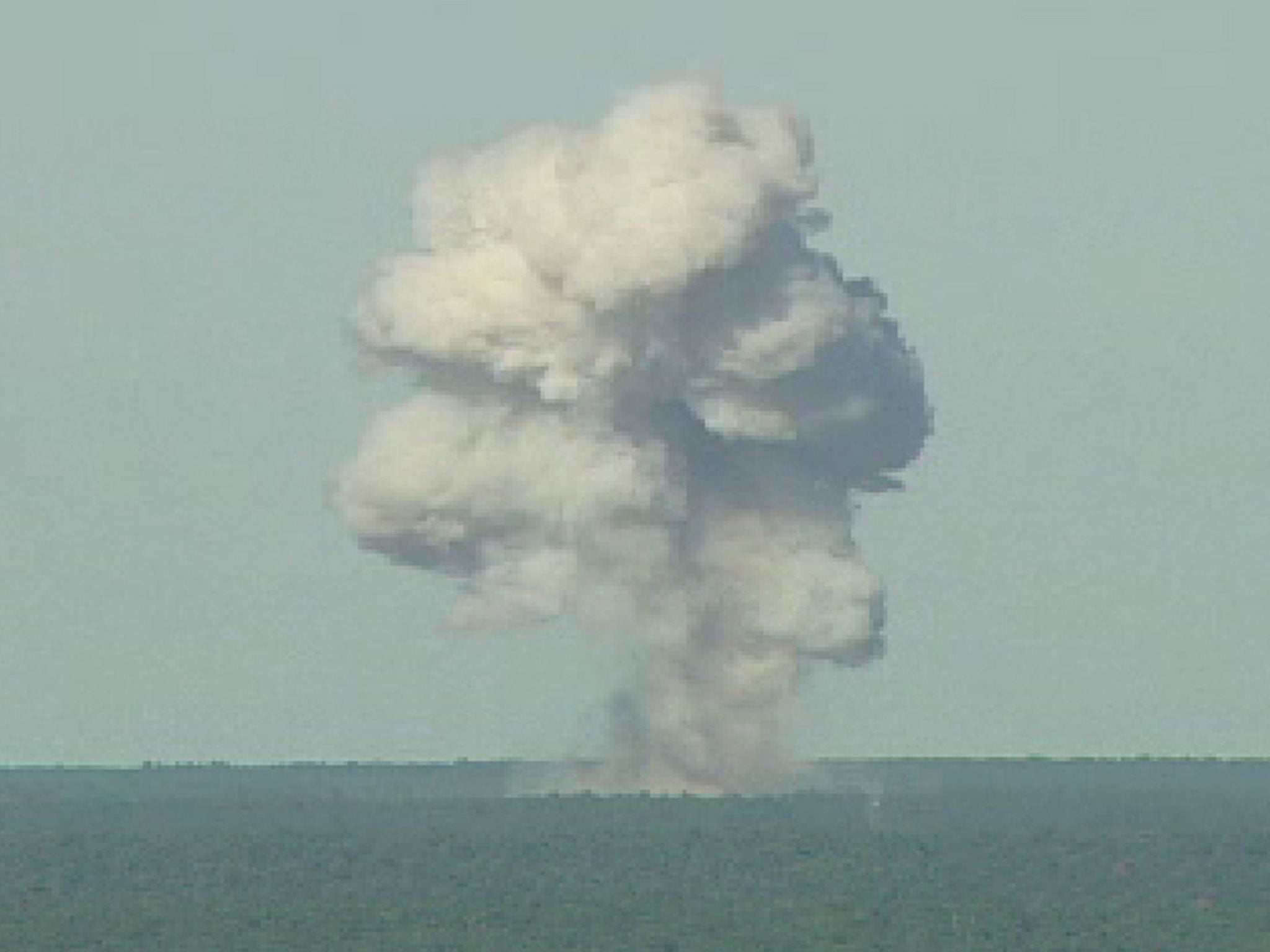 A GBU-43 bomb, or Massive Ordnance Air Blast (MOAB) bomb, explodes on 21 November 2003 at Eglin Air Force Base in Florida