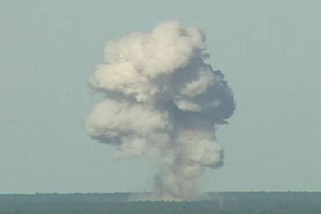 A GBU-43 bomb, or Massive Ordnance Air Blast (MOAB) bomb, explodes on 21 November 2003 at Eglin Air Force Base in Florida