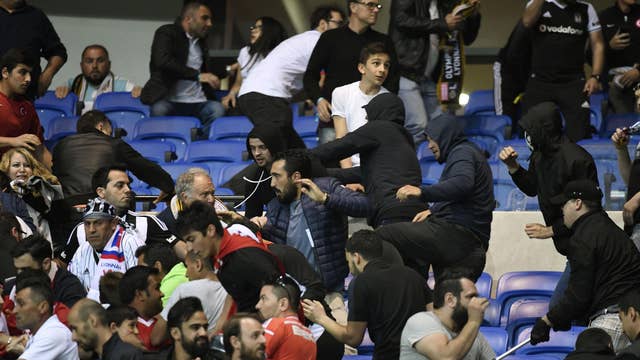 Lyon Vs Besiktas Delayed After Projectiles And Firecrackers Cause Fans To Run Onto The Pitch For Safety The Independent The Independent
