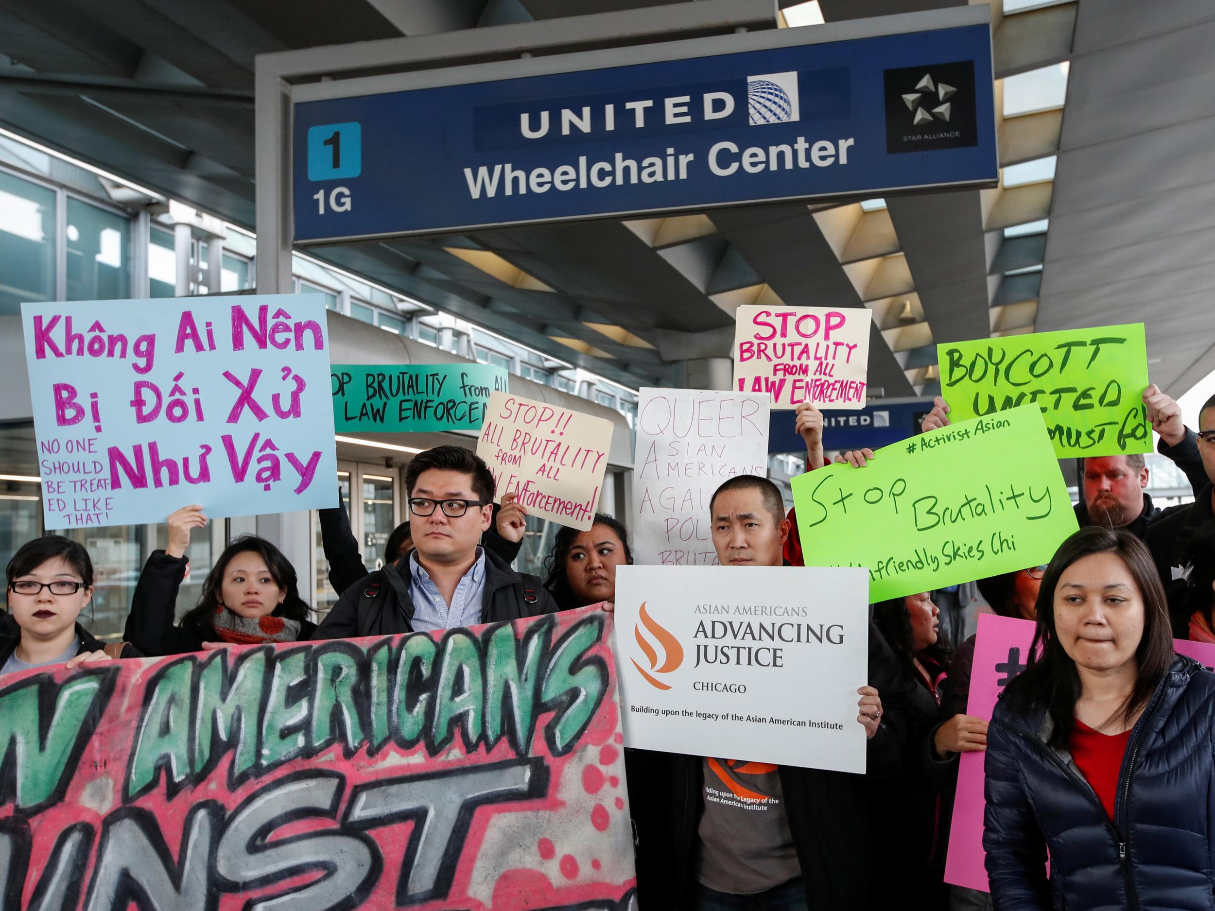 Protesters at O'Hare International Airport in Chicago, where doctor David Dao was forcibly removed from a United Airlines flight