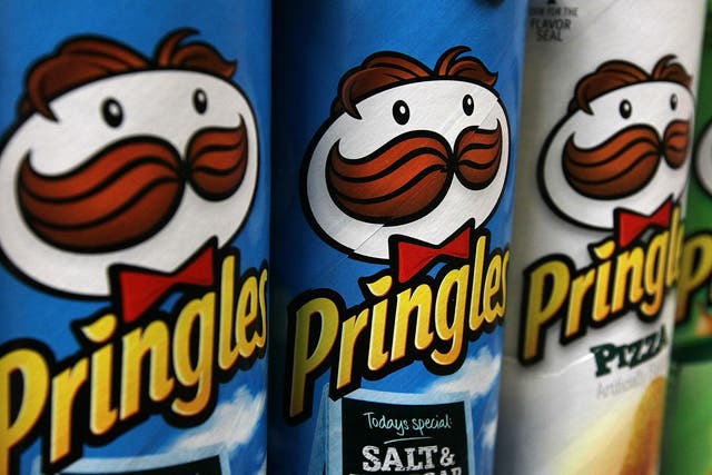 Simon Ellin said the iconic Pringles snack packaging which includes a metal base, plastic cap and foil-lined cardboard sleeve was a 'nightmare'