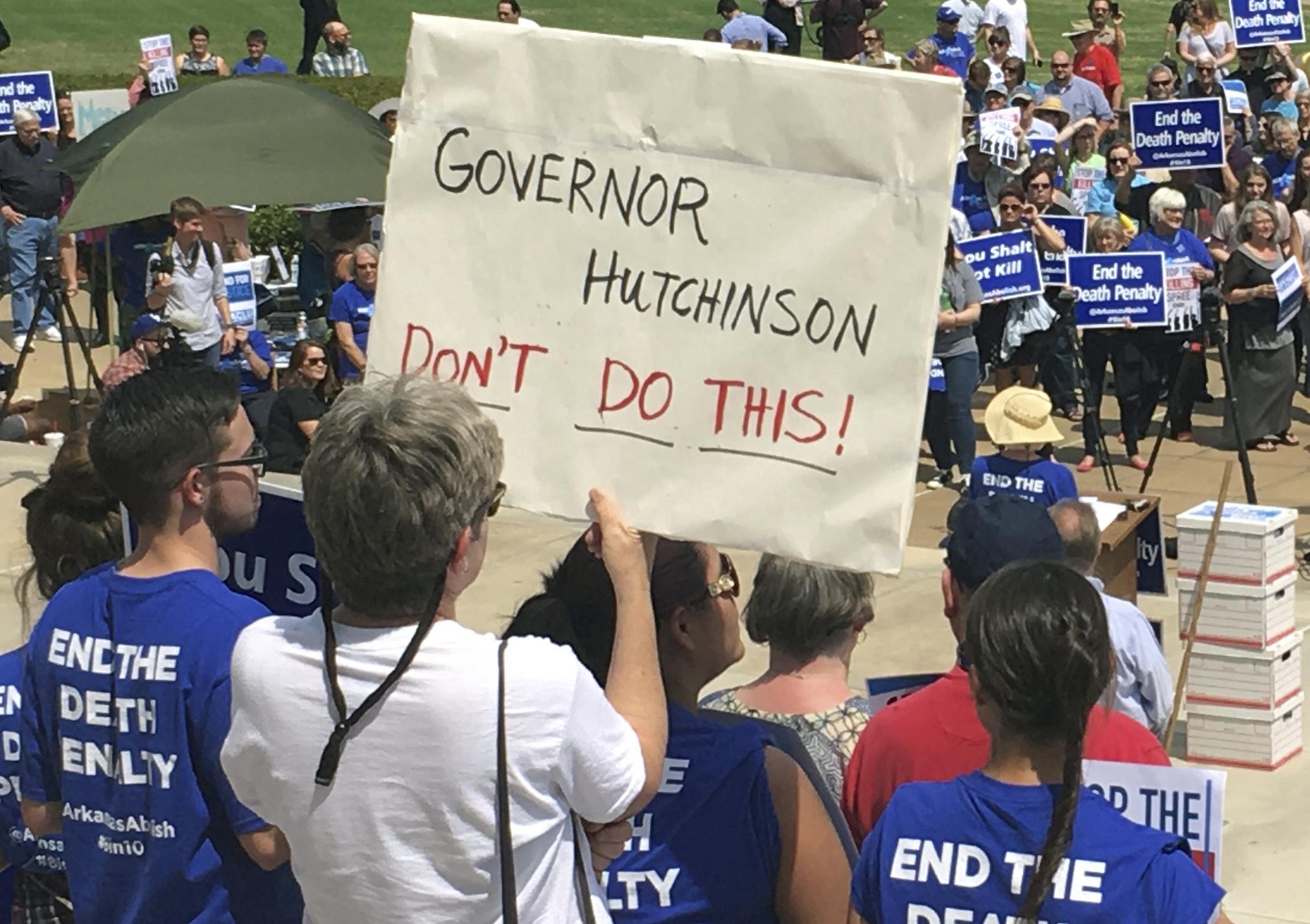 Protesters gather outside the state Capitol building in Little Rock, Arkansas to protest the planned executions of eight inmates