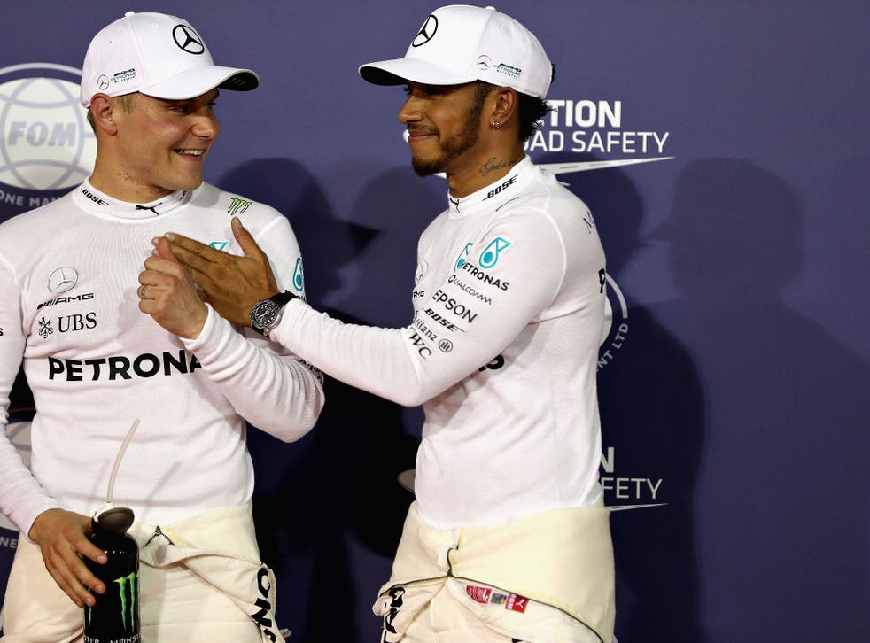 The two Mercedes racers together on the podium