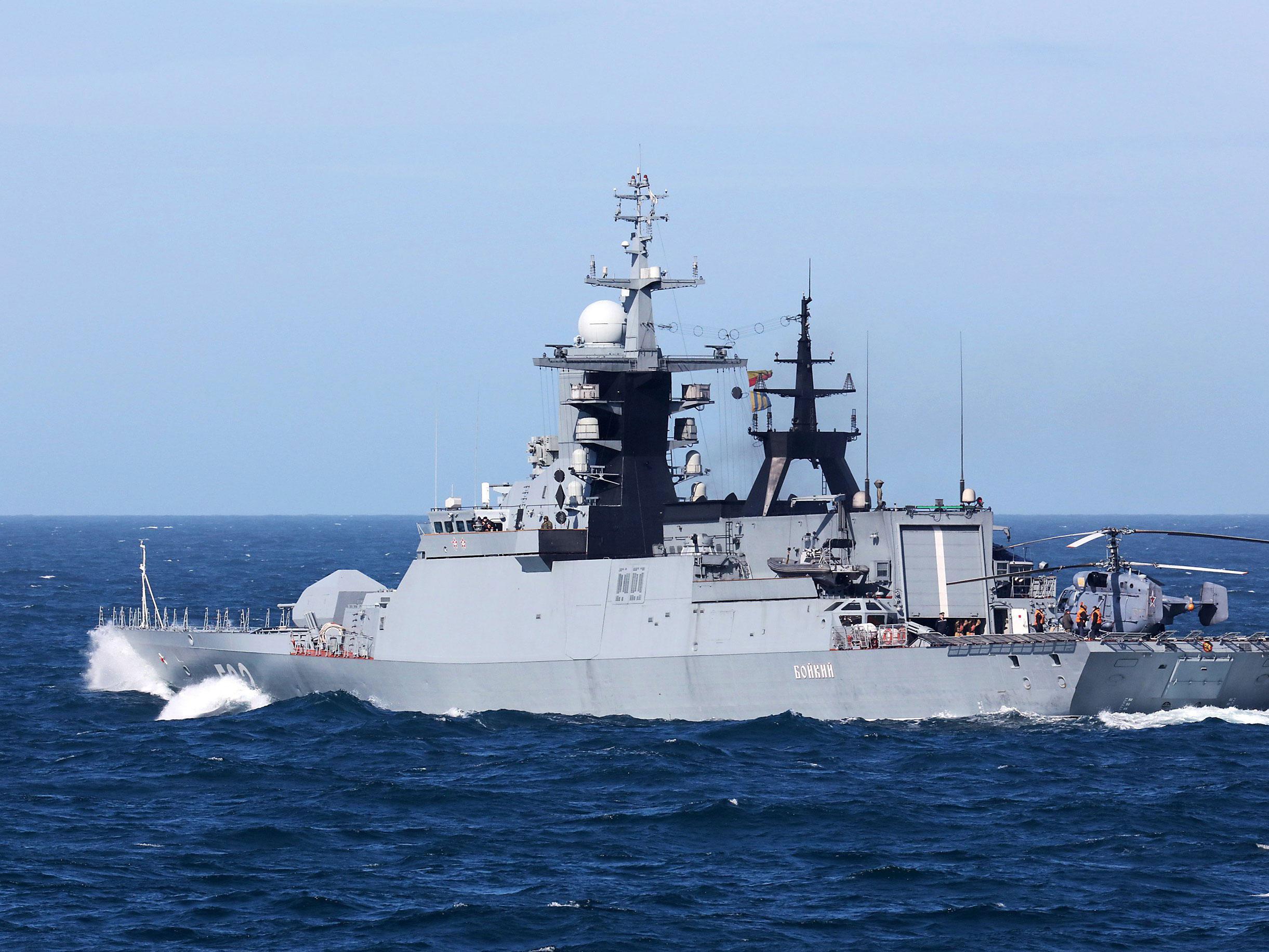 Russian frigate Boikiy being escorted off the British coast byHMS Sutherland