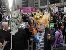 Trump claims protests demanding he publish tax returns were paid for