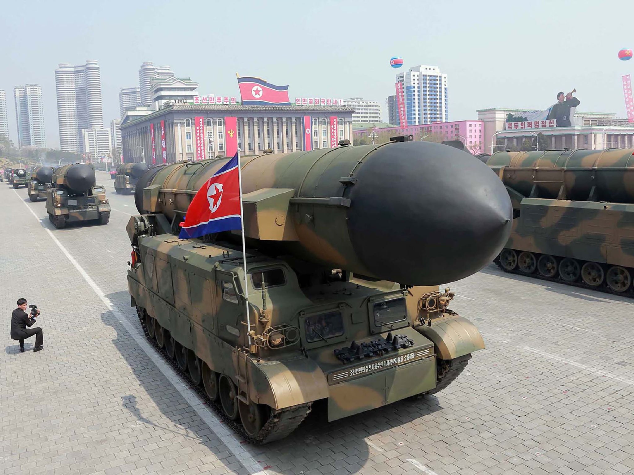 Korean People's Army ballistic missiles being displayed through Kim Il-Sung square during a military parade in Pyongyang marking the 105th anniversary of the birth of late North Korean leader Kim Il-Sung