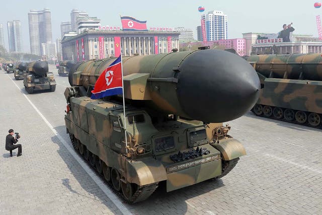 Korean People's Army ballistic missiles being displayed through Kim Il-Sung square during a military parade in Pyongyang marking the 105th anniversary of the birth of late North Korean leader Kim Il-Sung