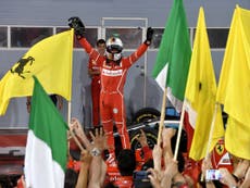 Vettel claims victory in Bahrain after Hamilton is handed time penalty
