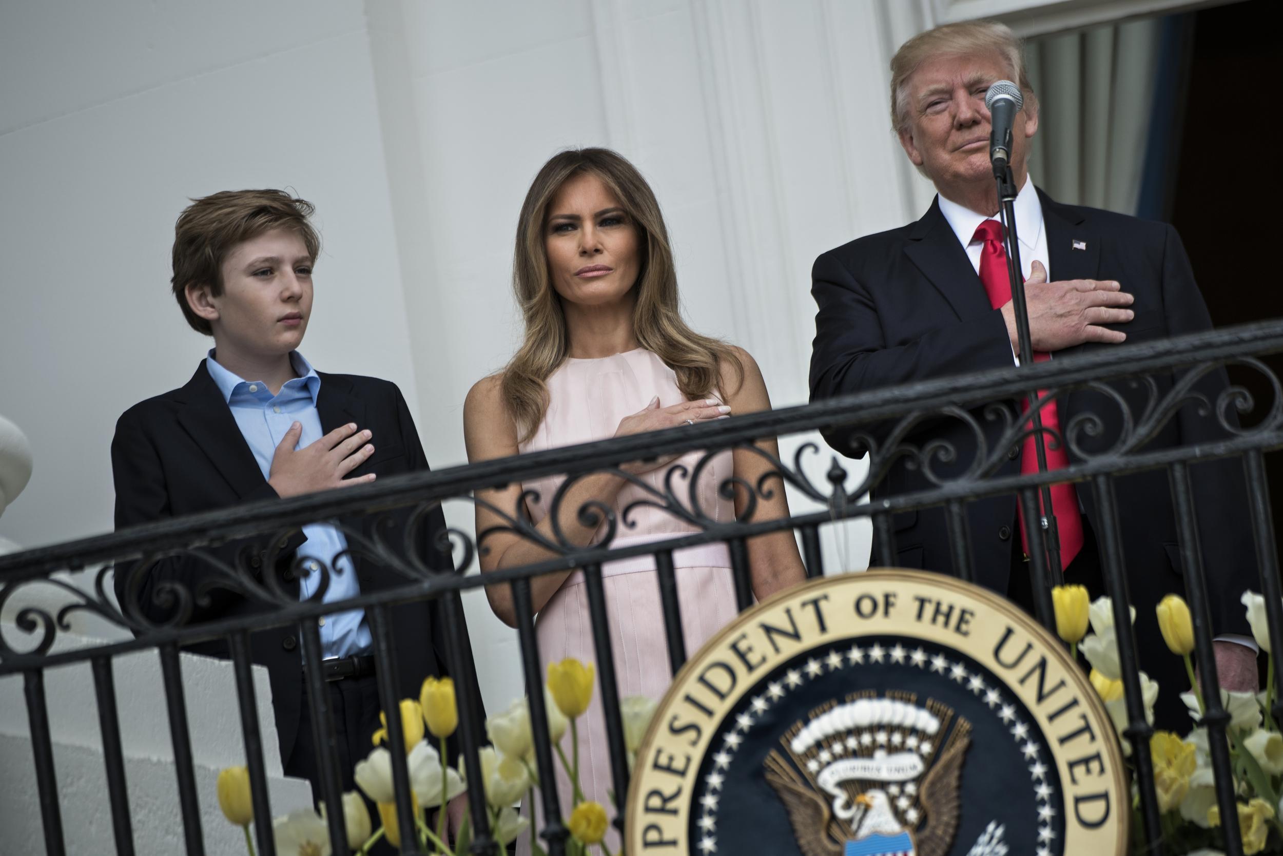 First Lady Melania Trump had to nudge Donald Trump to put his hand on his heart at the start of the national anthem during the annual White House Easter egg roll