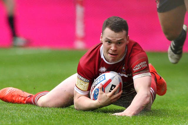 Liam Marshall scored a late try to clinch Wigan's victory over Wakefield