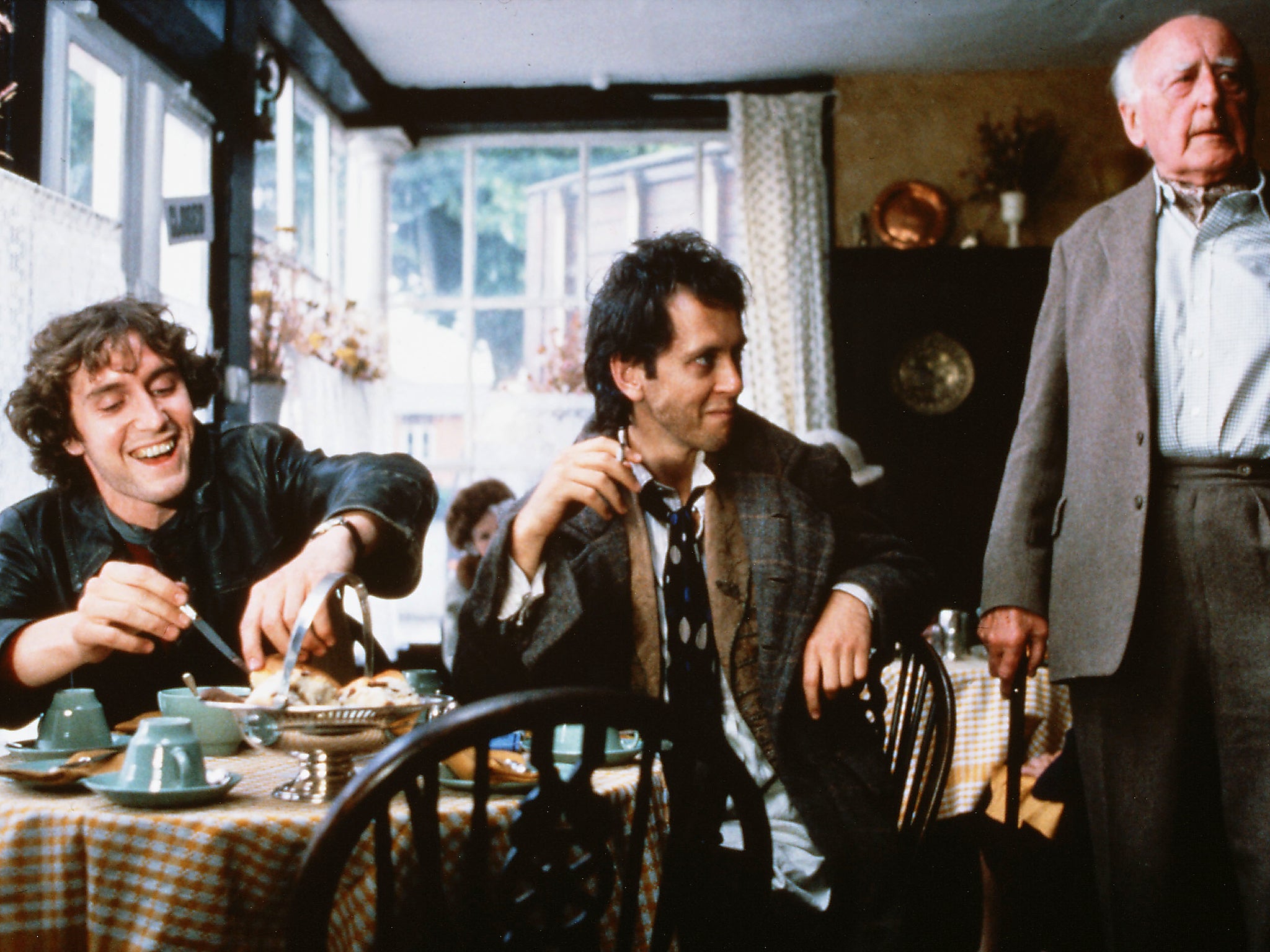 The Penrith tea-rooms, looking for cake and fine wine: Paul McGann, Richard E Grant, and Llewellyn Rees in Withnail and I