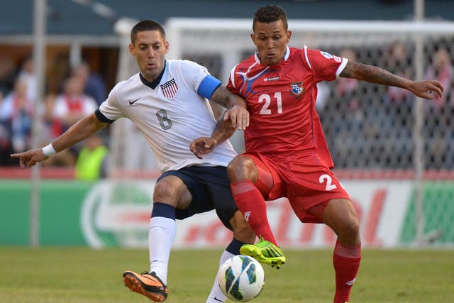 Amilcar Henriquez playing against Clint Dempsey in a 2013 match