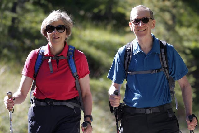 Theresa May and husband Philip on a previous walking holiday in the Swiss Alps