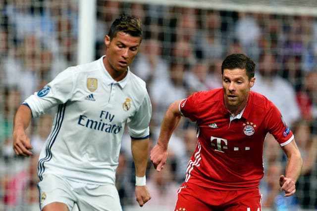 Cristiano Ronaldo comes up against former team-mate Xabi Alonso
