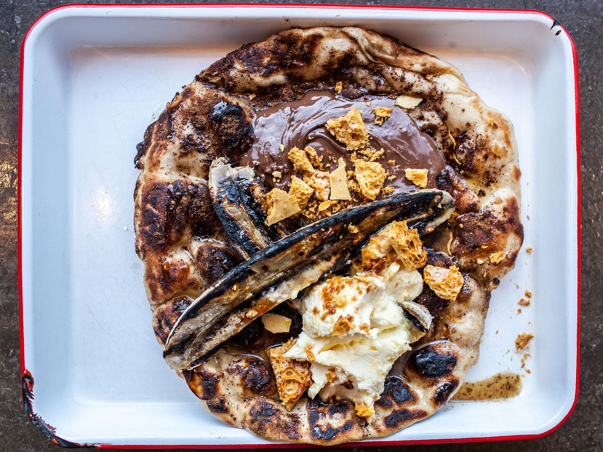 The grown-up crunchie: a velvety chocolate and cardamom bowl topped with homemade honeycomb and a dollop of tangy yoghurt