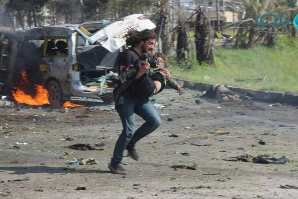 Syrian photographer who rescued child from Aleppo bus bombing speaks ...