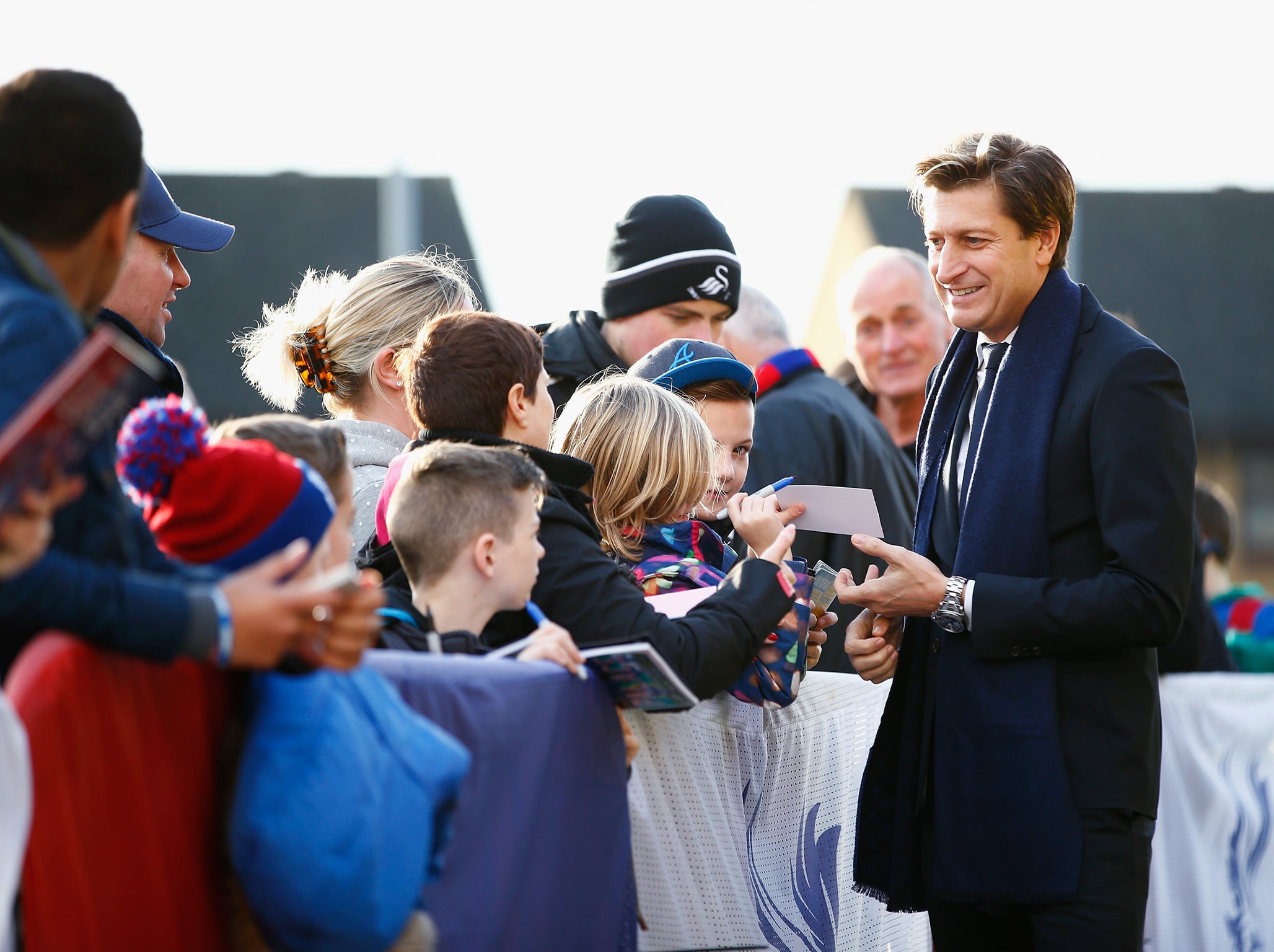 Parish signs autographs for fans