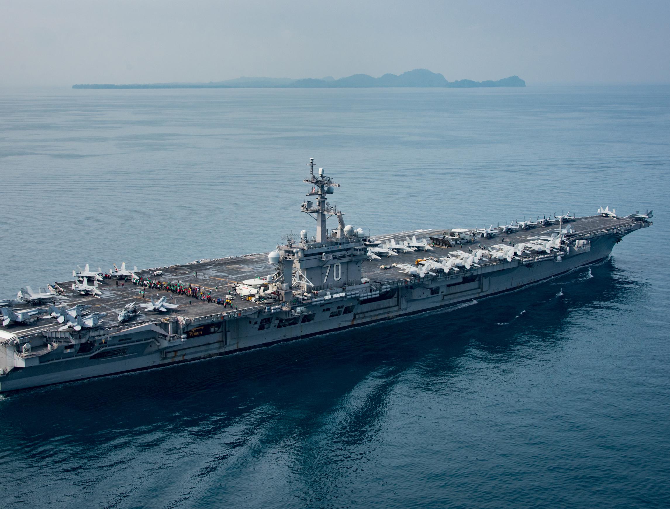 The aircraft carrier USS Carl Vinson (CVN 70) transits the Sunda Strait on 14 April 2017 in Indonesia