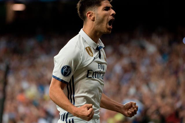 Marco Asensio celebrates his extra-time goal against Bayern