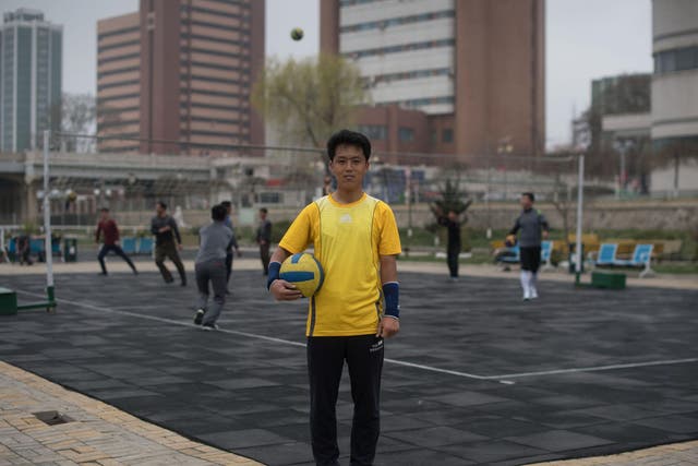 Amateur volleyball player Kim Hyok poses for a portrait during a practice session in Pyongyang. The sport is hugely popular in the rogue nuclear state