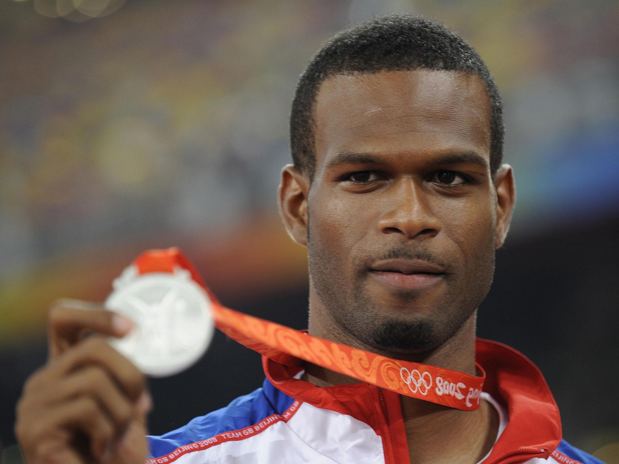 Germaine Mason, pictured with his silver medal at the 2008 Beijing Games, died in the early hours of Thursday morning