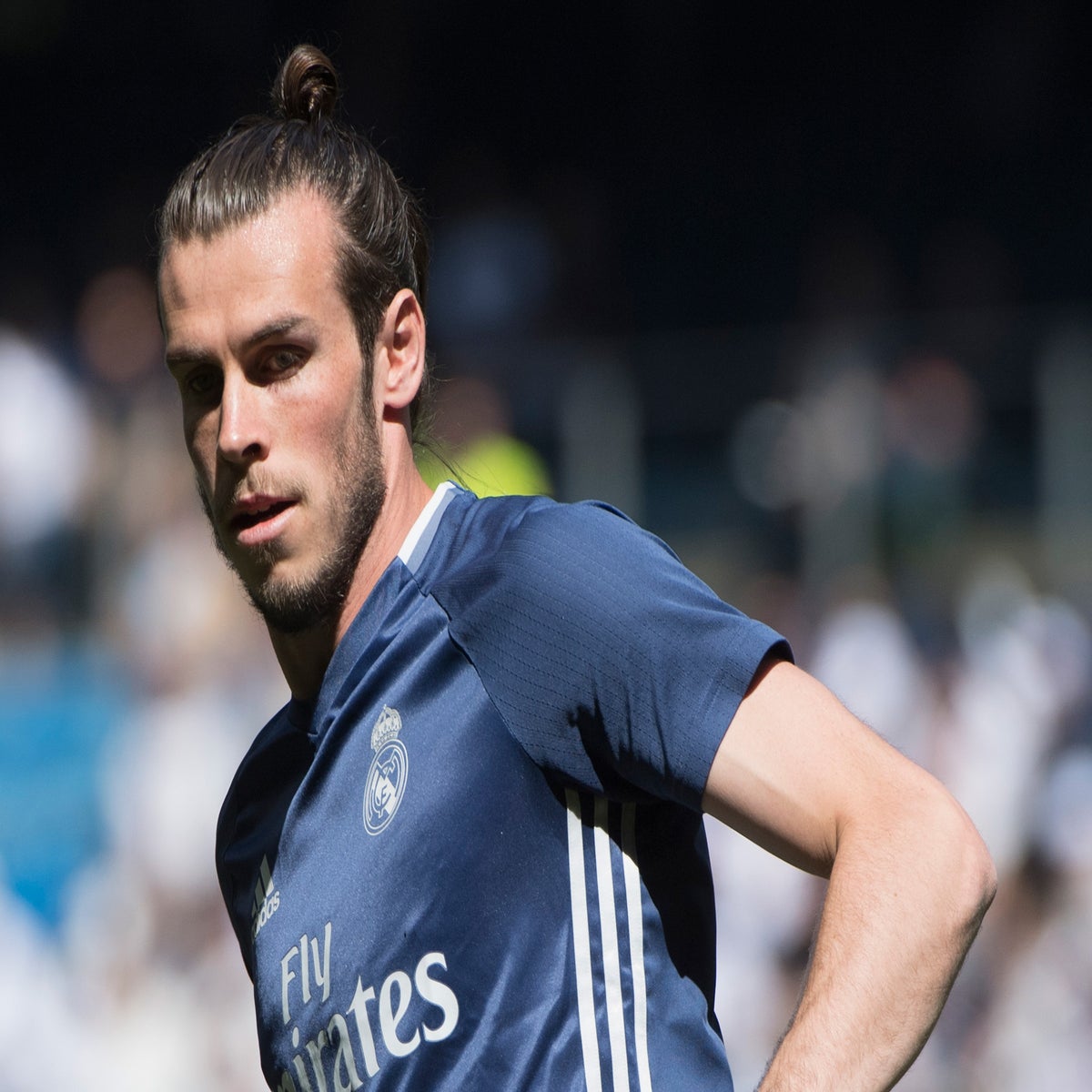 Gareth Bale lets his hair down during Wales' disappointing 1-1