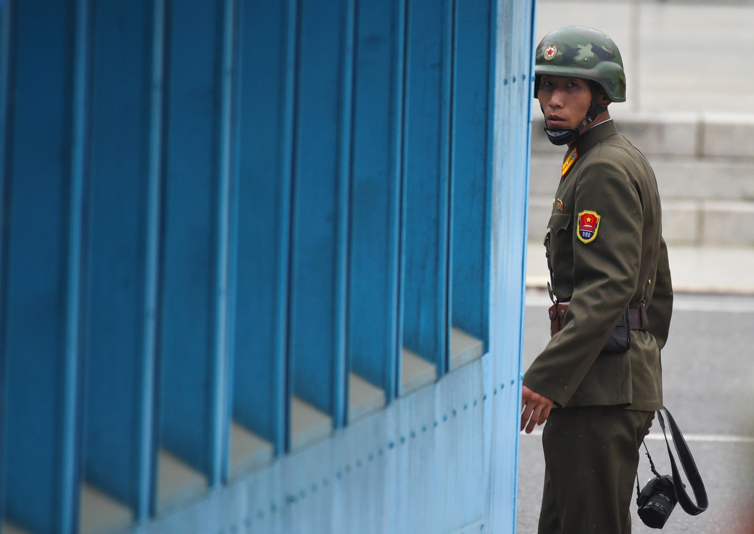 A North Korean patrols one of side of the Demilitarised Zone on the border with South Korea
