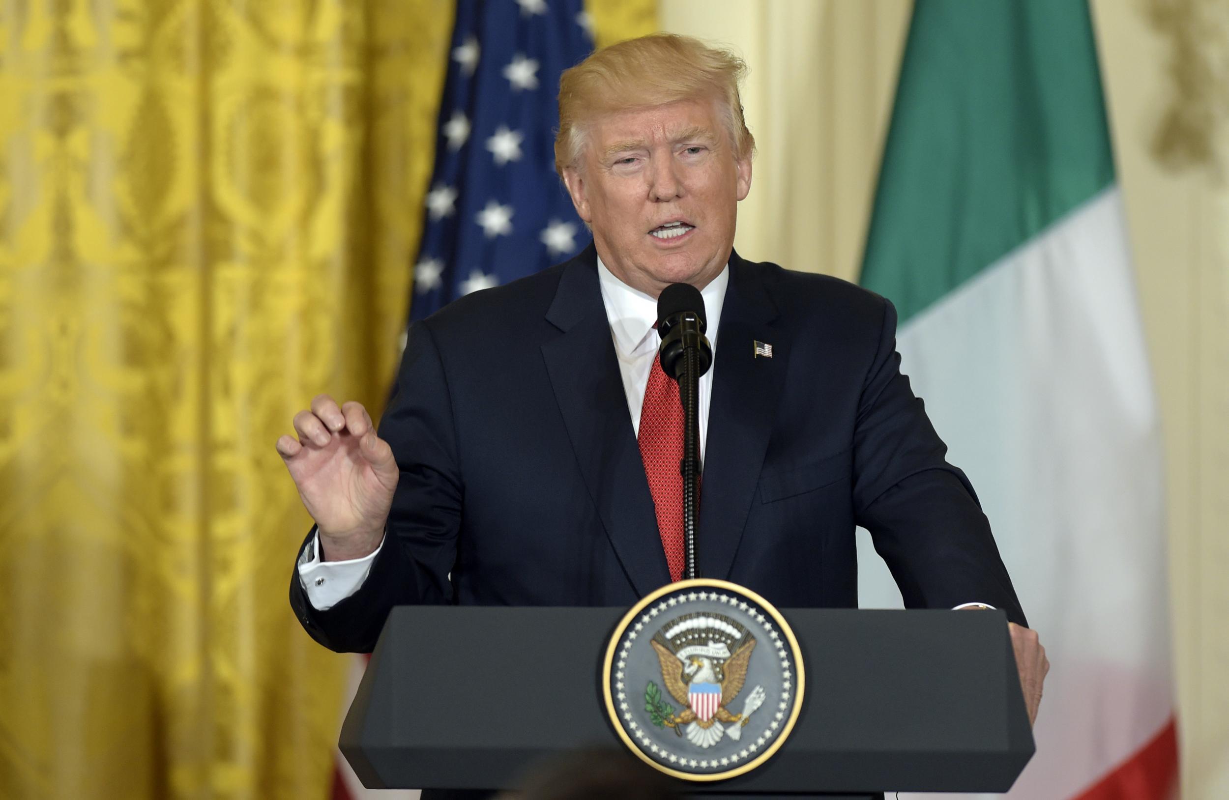 President Donald Trump speaks during a news conference with Italian Prime Minister Paolo Gentiloni