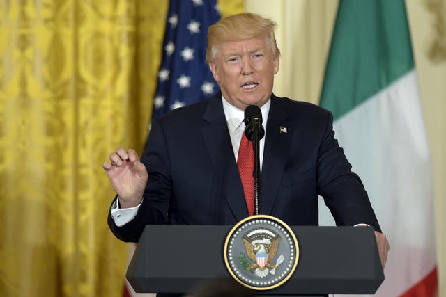 President Donald Trump speaks during a news conference with Italian Prime Minister Paolo Gentiloni
