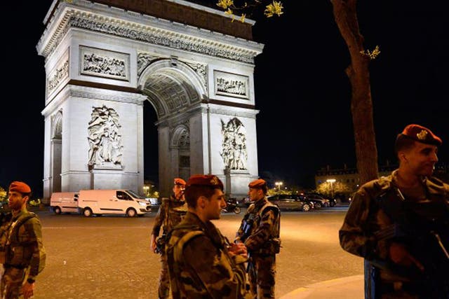 French military police secure the area near the Champs-Elysees yesterday