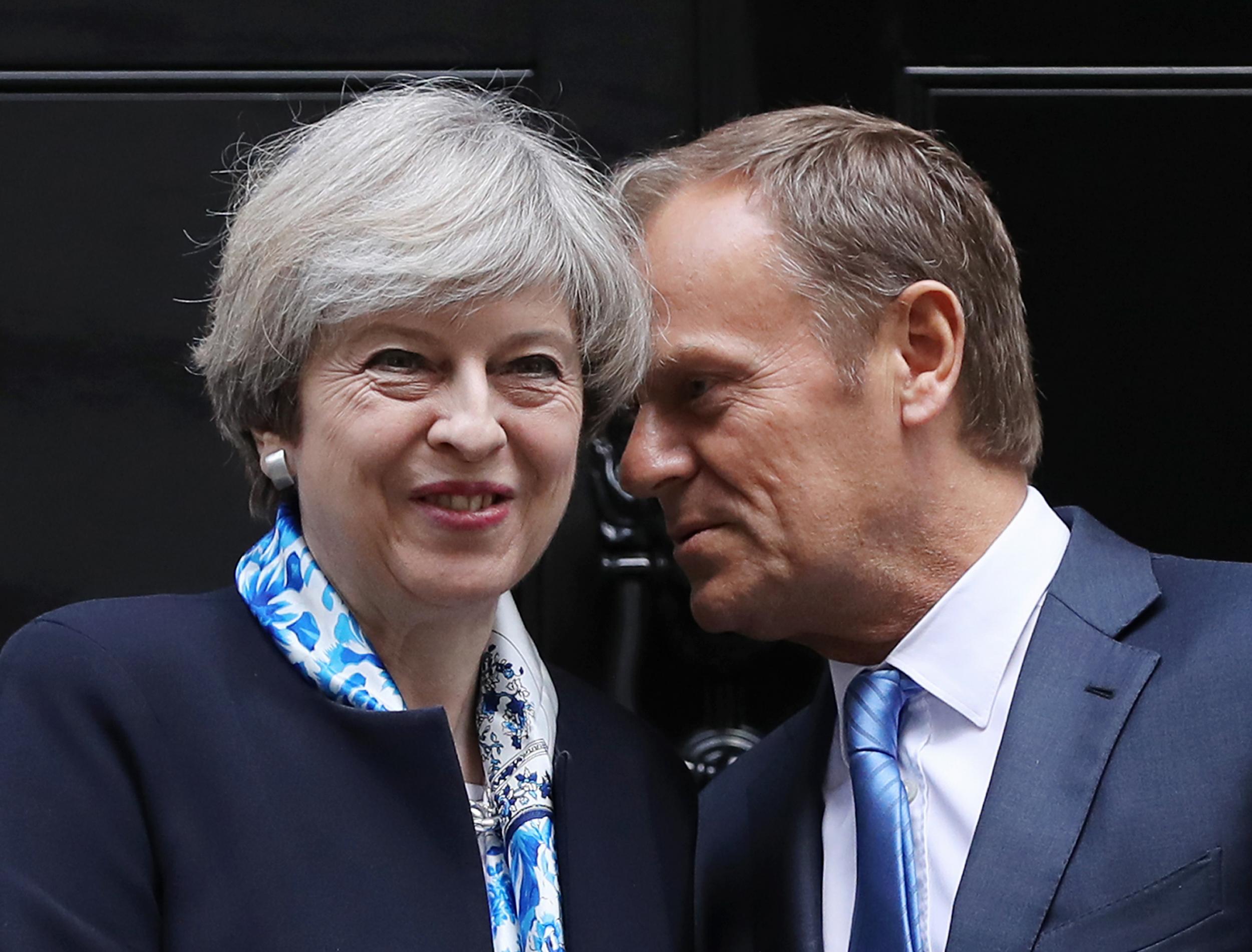 British Prime Minister, Theresa May, greets The President of the European Council, Donald Tusk