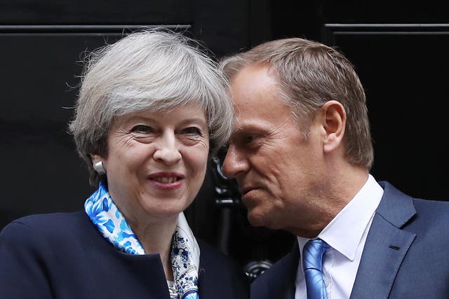 British Prime Minister, Theresa May, greets The President of the European Council, Donald Tusk