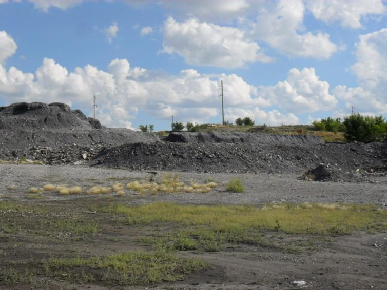 Spoil tips from current and historic mining operations, such as this gold mine in Kazakhstan, could provide new ways to draw carbon dioxide from the atmosphere