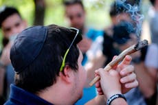 Israelis hold mass marijuana smoking protest outside parliament 