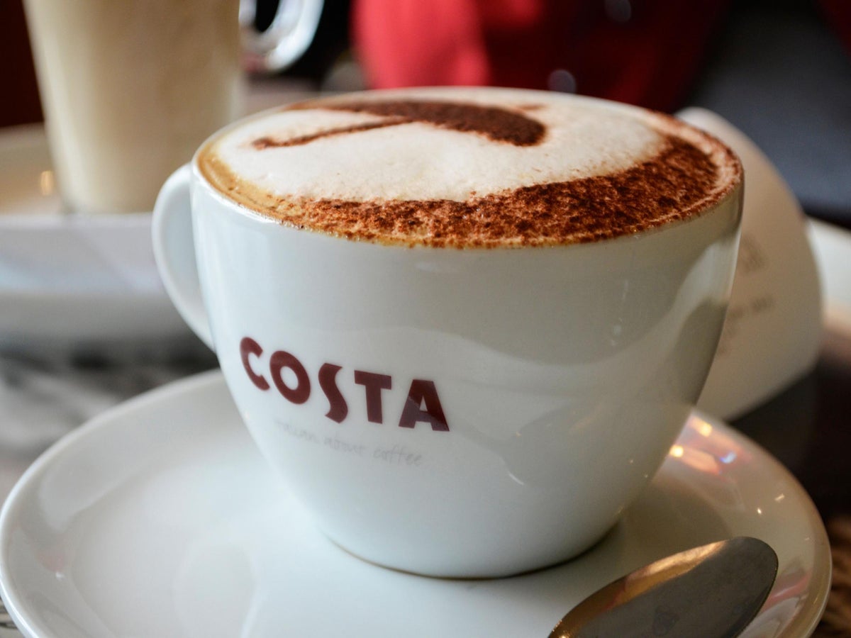 A man proved a large cup of Costa coffee fits into a regular cup