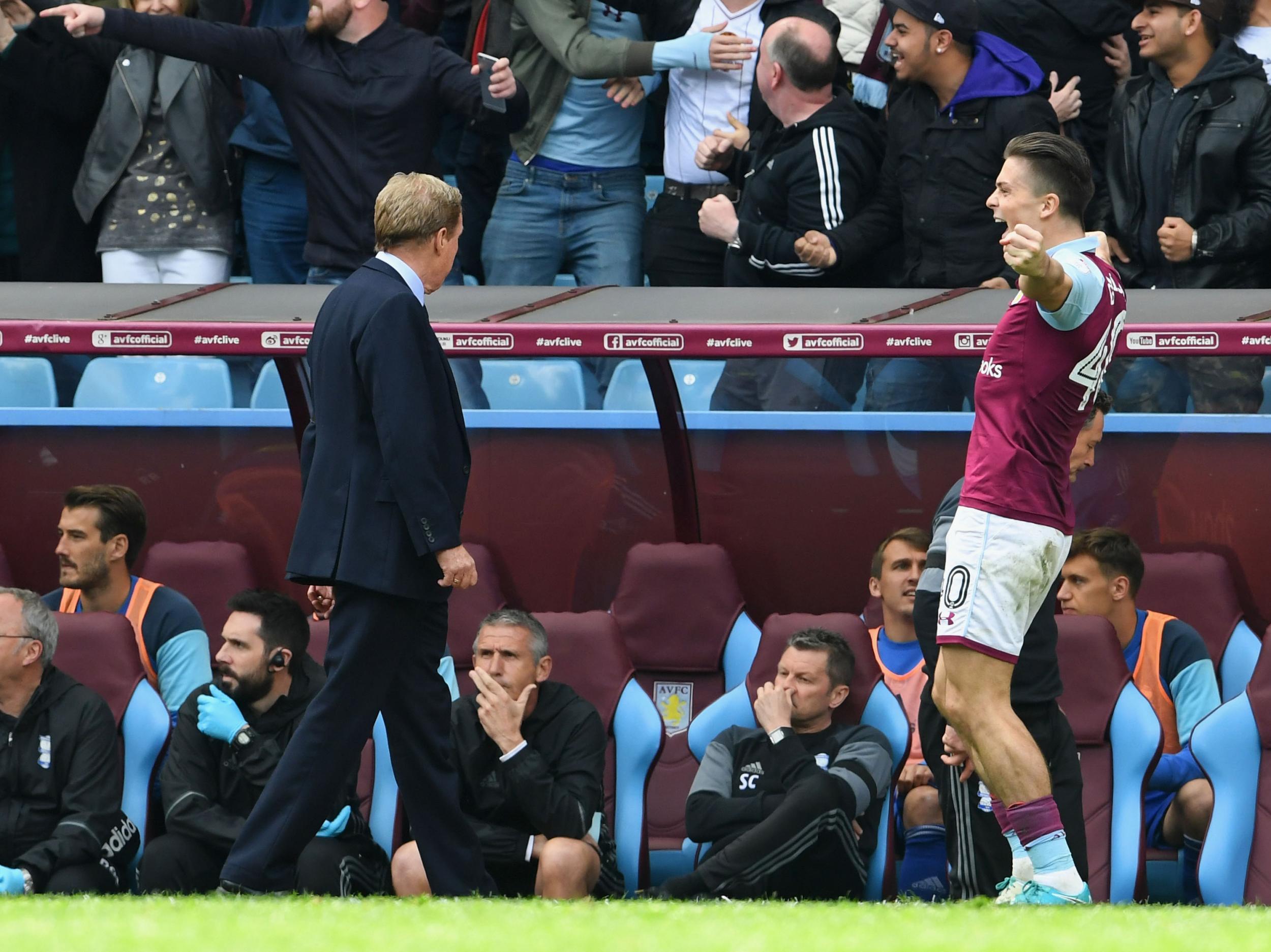 Jack Grealish celebrates right in front of the Birmingham dugout