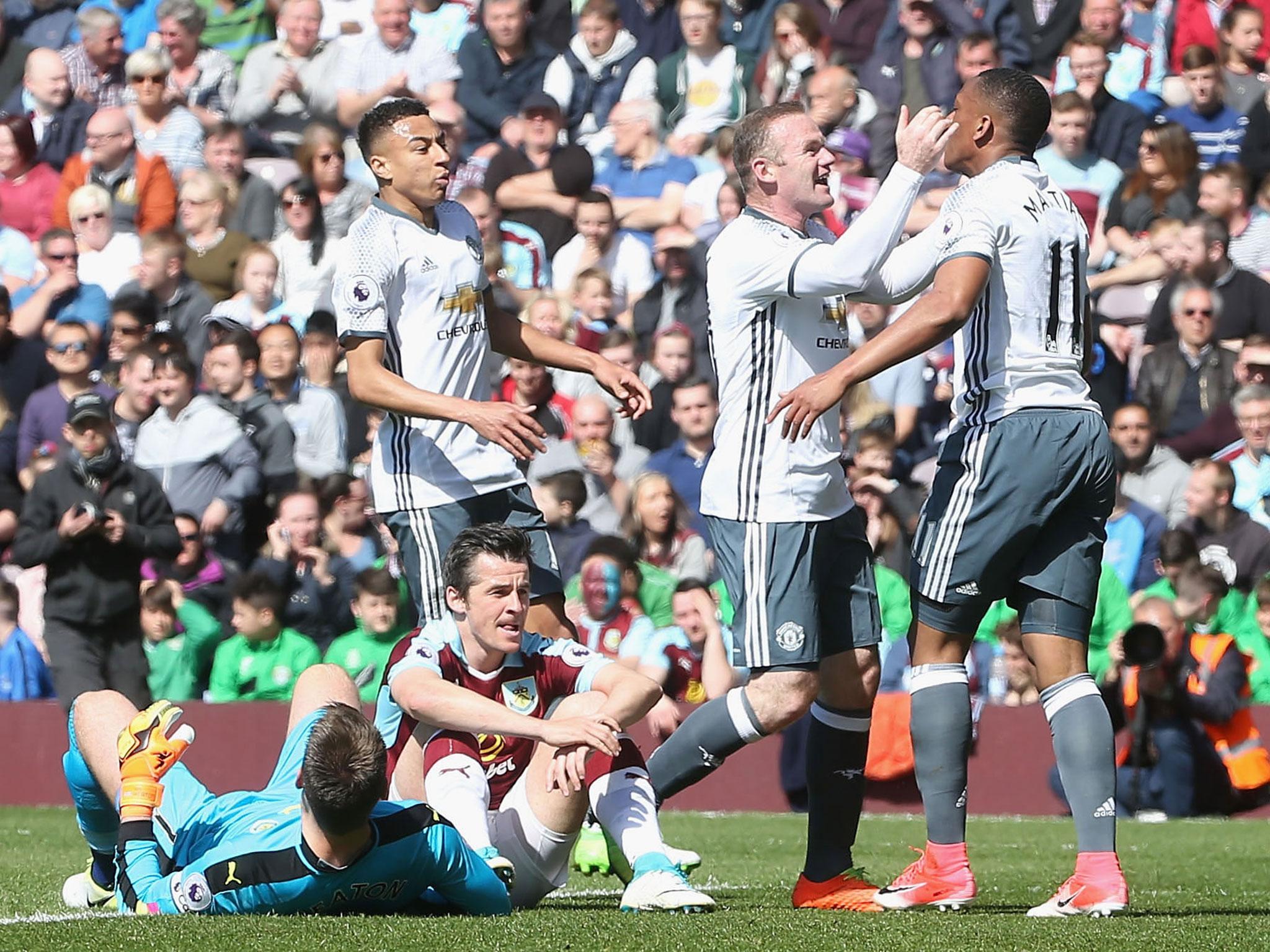 Wayne Rooney celebrates after Anthony Martial puts Manchester United ahead of Burnley