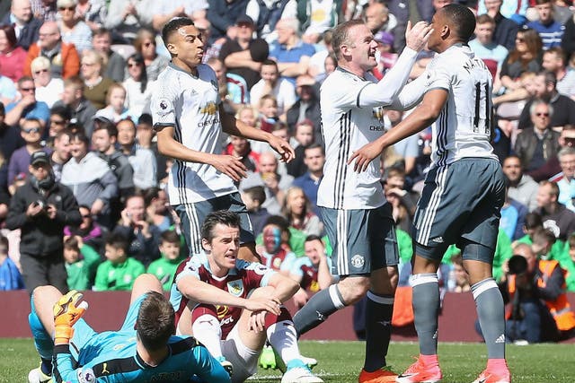 Wayne Rooney celebrates after Anthony Martial puts Manchester United ahead of Burnley