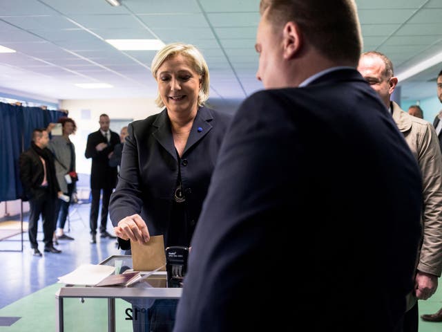 As voting drew to a close in round one of a bitterly contested presidential race, polling suggested Le Pen and centrist Emmanual Macron were in the lead