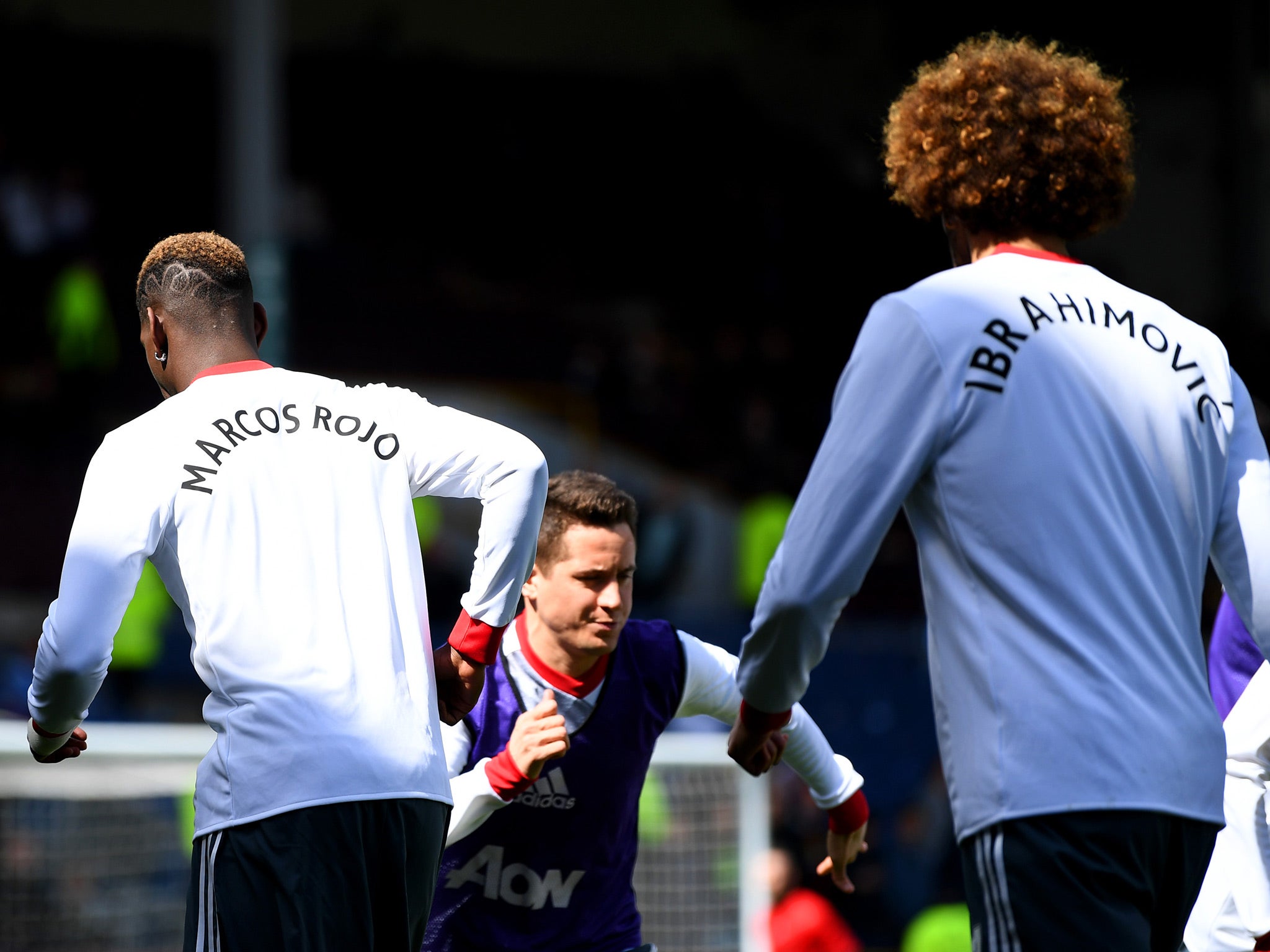 United's players paid tribute to their injured teammates at Turf Moor