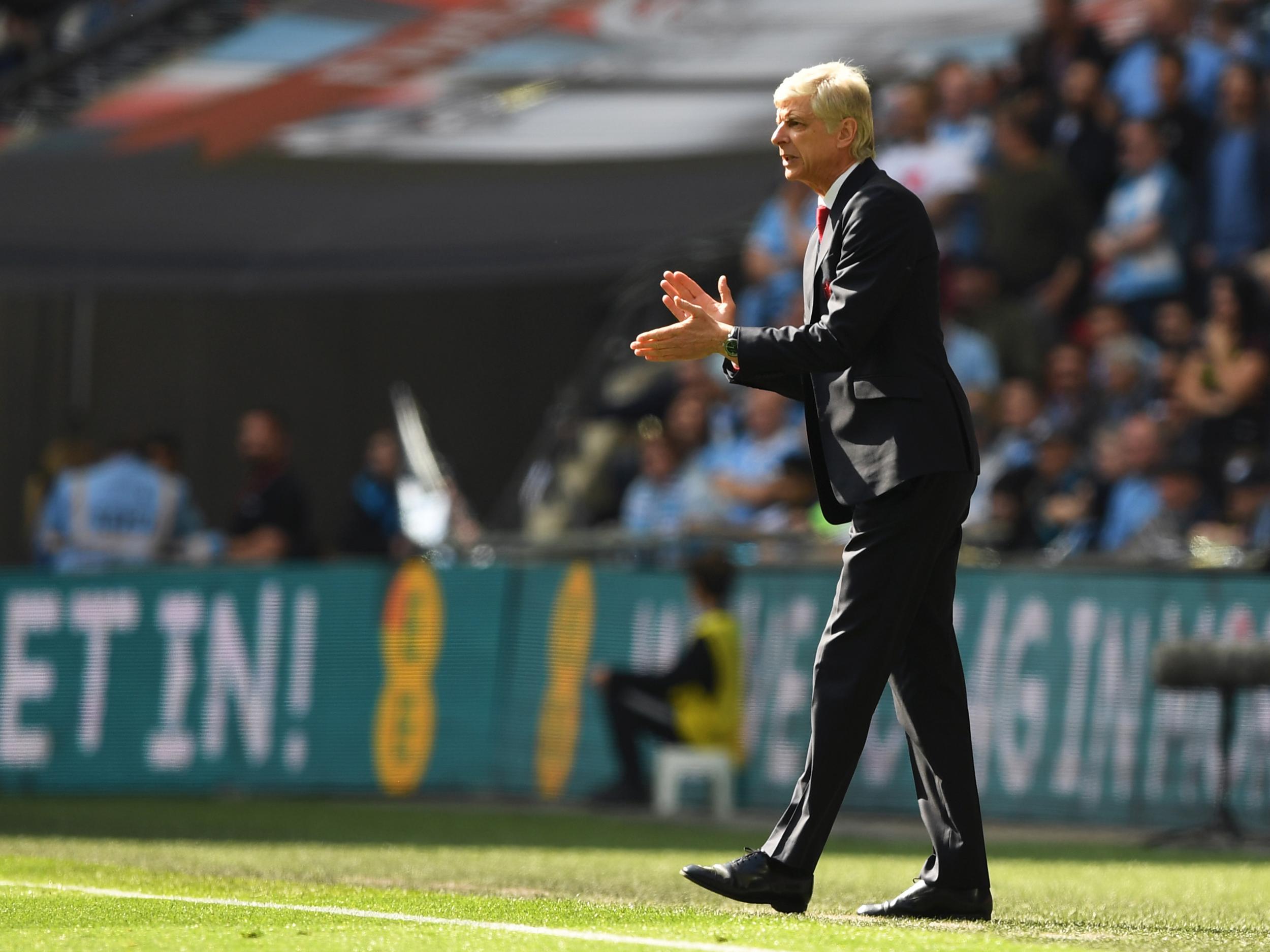 Wenger is beginning to experiment with a 3-5-2 formation