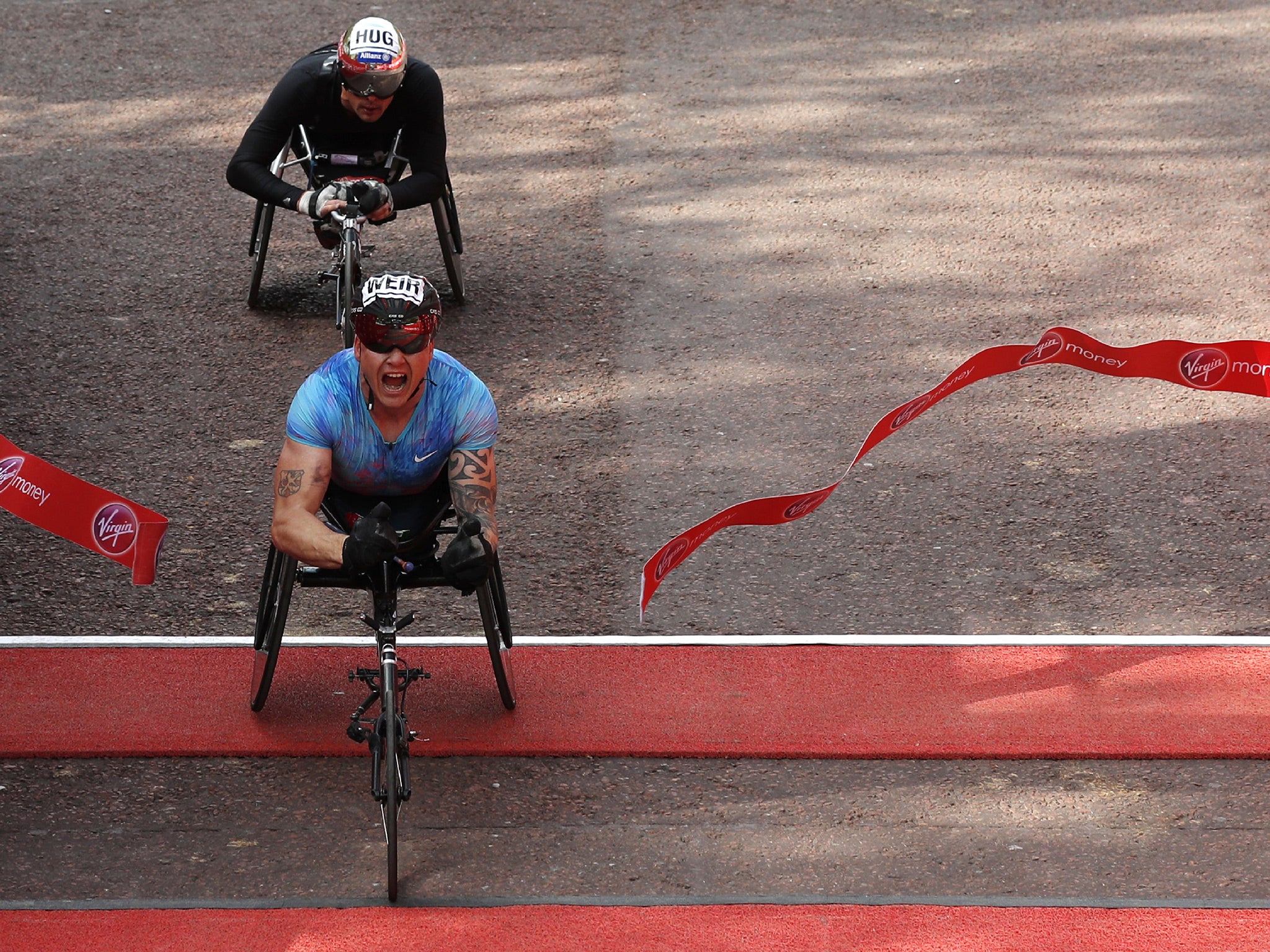Weir crosses the line in the men's wheelchair race