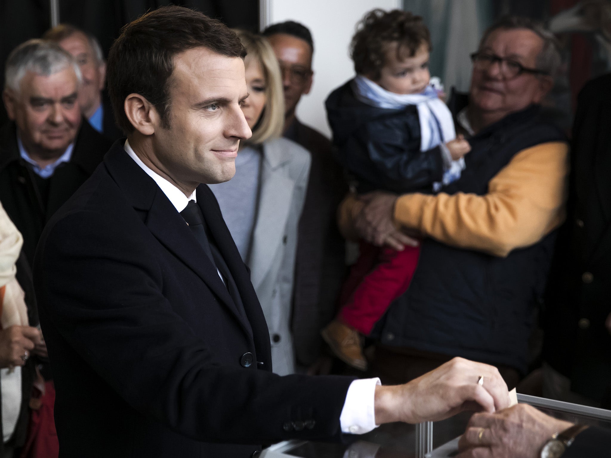 Emmanuel Macron, leader of the En Marche! movement, casts his vote on Sunday