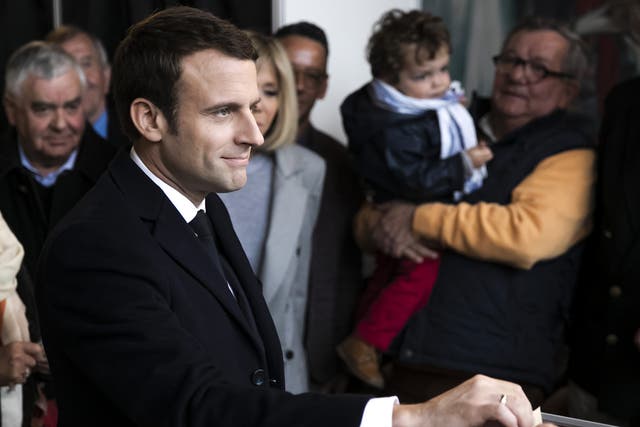 Emmanuel Macron, leader of the En Marche! movement, casts his vote on Sunday