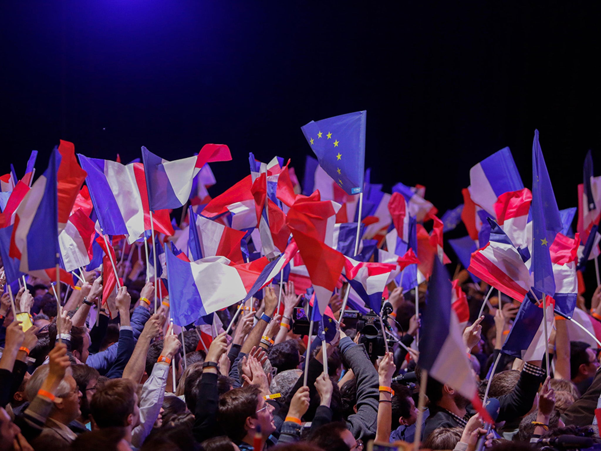 Supporters of Marine Le Pen celebrate her victory