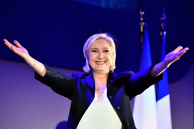 Marine Le Pen salutes her supporters as results come in