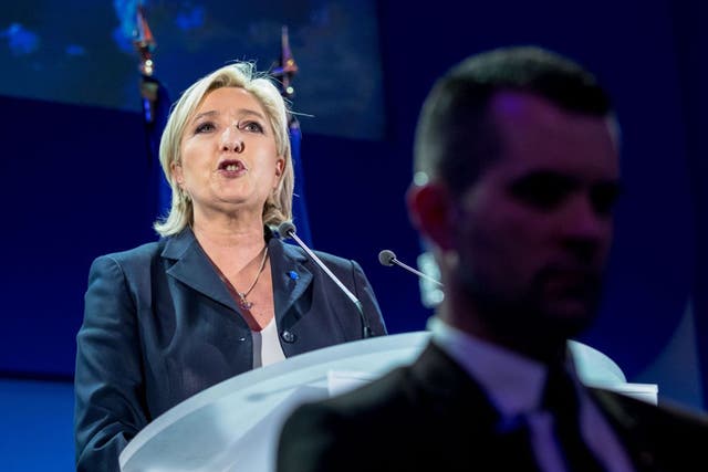 A triumphant Marine Le Pen addresses her supporters in northern France on Sunday