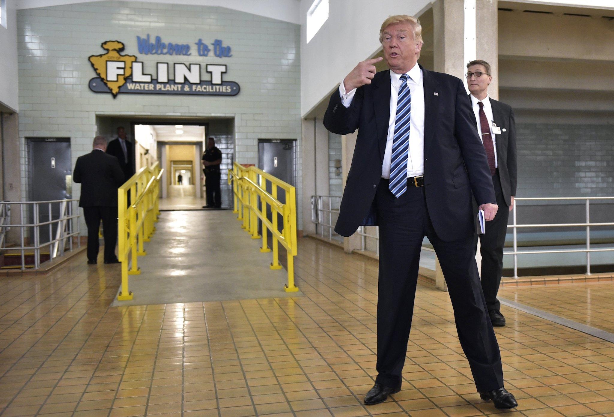 Republican presidential nominee Donald Trump speaks following a tour of the Flint water plant on September 14, 2016 in Flint, Michigan